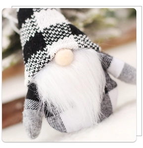 Close-up of knit fabric and plush beard texture on festive Christmas gnome pendant