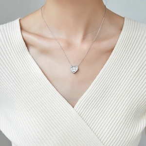 Silver 3D heart pendant necklace for women featuring sparkling cubic zirconia stones