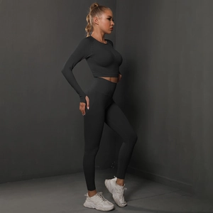 Detail of gray seamless peach lift yoga set showing textured knit fabric and stitching