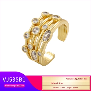 Detailed view of gold multi-layer brass ring featuring clear oval zirconia and 21x22mm dimensions