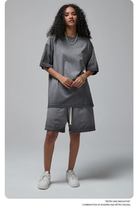 Detail of dark grey cotton short sleeve t-shirt and matching elastic waist shorts set