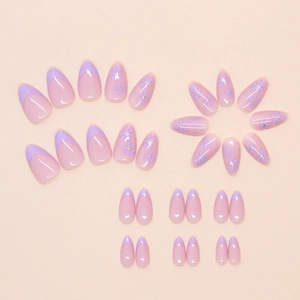 Almond-shaped press-on nails in purple floral and French design on beige background