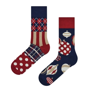 Detail of Christmas crew socks featuring mismatching patterns with argyle and festive ornaments