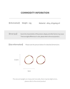 Detail specifications of red and gold enamel hoop earrings showing 5.5cm diameter size