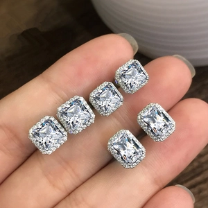 Exquisite square green zircon halo stud earrings set in polished silver finish