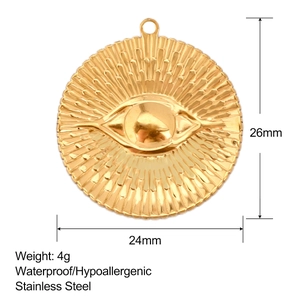 Detailed 26mm gold stainless steel evil eye pendant with radial texture and dimensions
