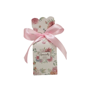 Elegant floral gift box with pink ribbon and rose pattern for weddings and holidays