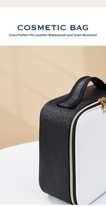 Detail of waterproof cross-grain black PU leather cosmetic bag with gold metal zipper