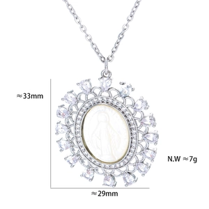 Detail shot of Virgin Mary pendant with dimensions 33mm by 29mm and zircons