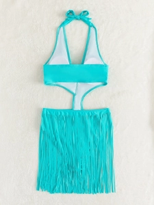 Détail d'un monokini dos nu bleu canard avec jupe à franges et nœud dans le dos