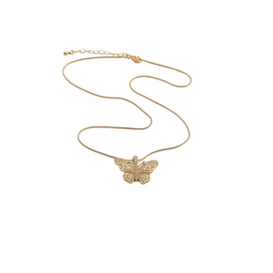 Detail view of a gold butterfly pendant featuring hollow design and sparkling zircons