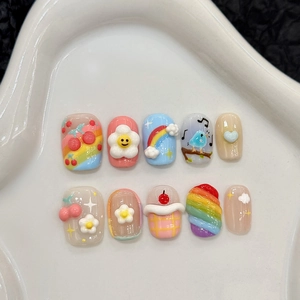 3D cartoon press-on nails featuring rainbow and flower designs in macaron colors