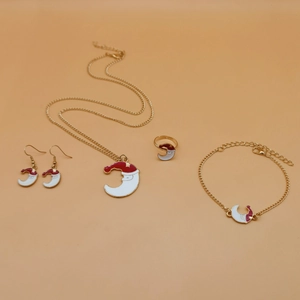 Flat lay of gold-plated alloy Christmas jewelry set with Santa Claus moon charms