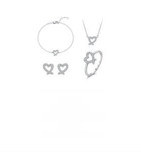 Close-up of S925 sterling silver hallmark on an asymmetric heart jewelry set