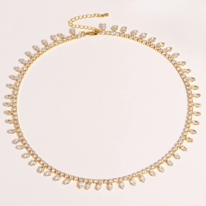 Detail of gold-plated tennis necklace with marquise-cut zircon and adjustable lobster clasp