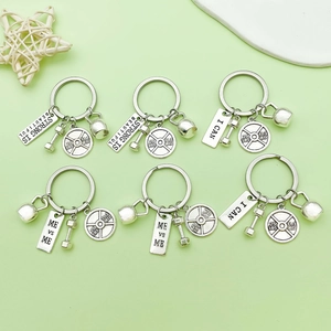 Set of 6 silver fitness keychains featuring dumbbells, kettlebells and gym charms