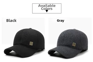 Detail view of winter baseball caps in black and grey with side metal brand patches