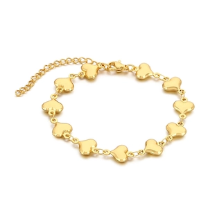 Gold stainless steel heart chain bracelet with polished hollow link design and lobster clasp