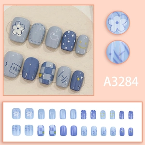 Blue 3D floral press-on nails set with heart and checkerboard patterns for students