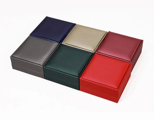 Detailed view of square jewelry boxes in six colors with high-end brushed leather finish