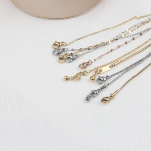 Détails de chaînes en acier inoxydable plaqué or 18K et argent avec fermoir mousqueton