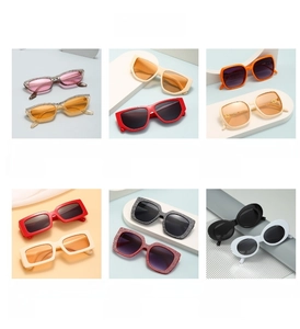 Makro-Detailansicht verschiedener bunter quadratischer Cat-Eye-Sonnenbrillen mit Strass
