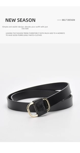 Close-up of elegant gold buckle detail and fine black leather texture of the belt