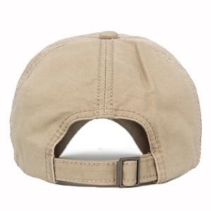 Detail of adjustable metal buckle and stitching on beige cotton baseball cap back