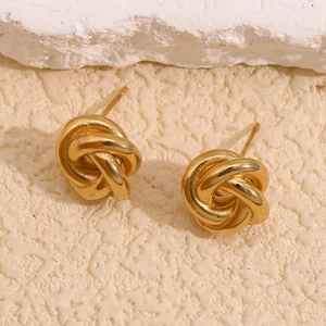 Detailed close-up of 18K gold plated stainless steel stud earrings with knot texture