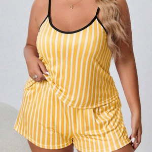 Women's yellow and white striped pajama set with camisole top and matching shorts