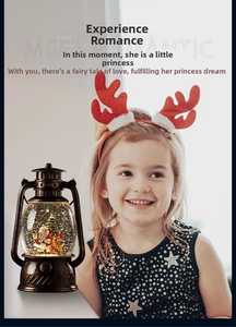 Macro shot of retro bronze Christmas lantern featuring Santa Claus and swirling snow glitter