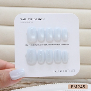 Handmade light blue pearl press-on nail set with 10 pieces on size marking display card