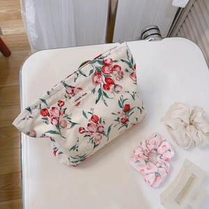 Vintage floral cotton makeup bag with red tulip patterns and cream white base fabric