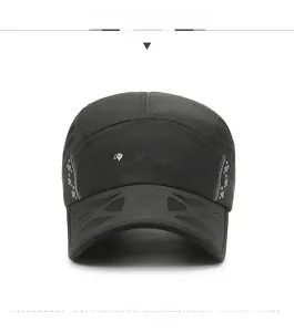 Detail of breathable mesh vents and SPORTS logo on a black quick-dry baseball cap