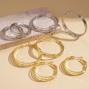 Geometric textured multi-layer hoop earrings in gold and silver metal finishes