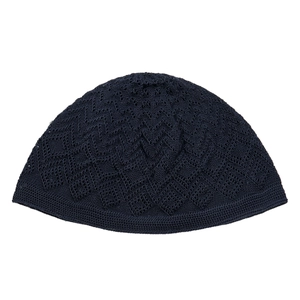 Detailed close-up of dark blue knit docker cap with intricate geometric mesh texture