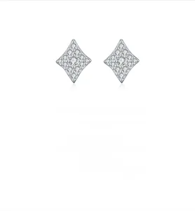 Detailed macro view of S925 silver stud earrings with pave-set moissanite diamonds