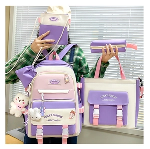 Detailed four-piece student backpack set in purple and pink including bags and pencil case