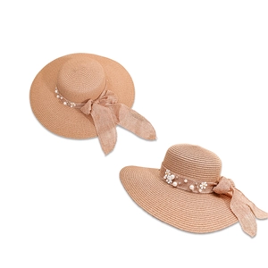 Women's wide brim straw sun hat with floral ribbon bow and pearl accents in natural tan