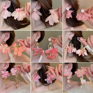 Elegant pink fabric flower earrings with pearls and rhinestones for a sweet vacation look