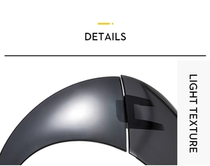 Detail of sleek gunmetal grey Y2K sunglasses frame with light texture and metallic finish