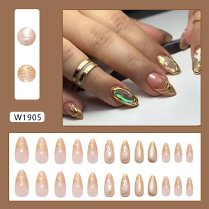 Golden sand pearl almond press-on nails set with foil details and 24 pieces