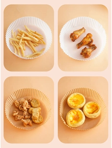 Disposable round air fryer paper liners used for serving fries, chicken wings, and tarts
