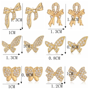 Detailed grid view of 18K gold plated butterfly and bow stud earrings with size annotations