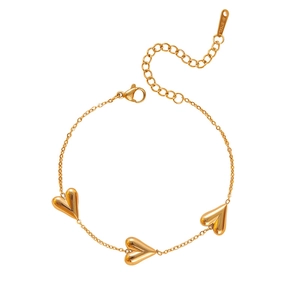 Elegant gold stainless steel bracelet with three heart charms and lobster clasp closure