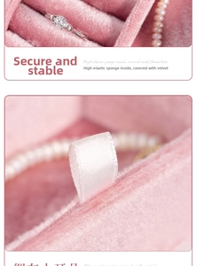 Macro shot of pink velvet jewelry box with high-elastic sponge ring slots and ribbon handle