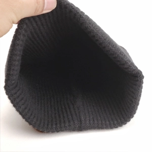 Classic black butterfly jacquard knit beanie showing thick ribbed texture and deep interior