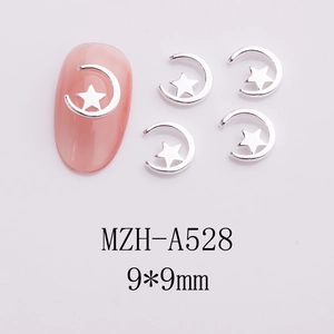 Macro view of 9x9mm silver star nail charms with hollow design on pink fingernails