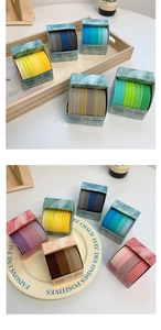 Close-up of assorted candy colored high elasticity hair bands in marble pattern gift boxes