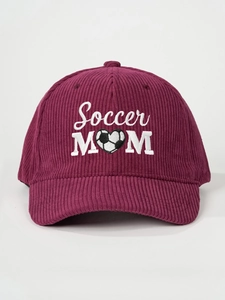 Detail of burgundy corduroy texture with white Soccer MOM and heart embroidery